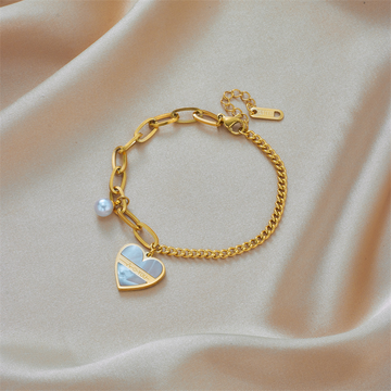 The Amour Pearl Heart Pendant Asymmetric Chain Bracelet