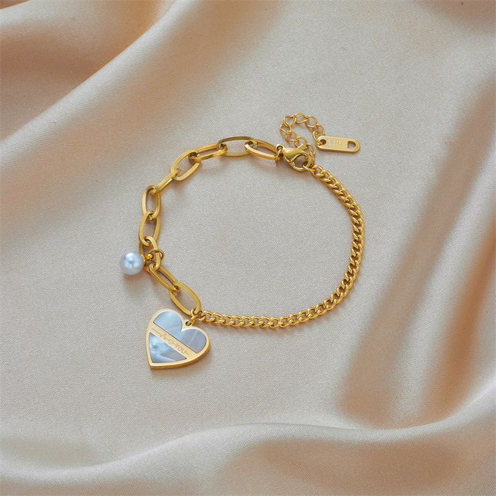 The Amour Pearl Heart Pendant Asymmetric Chain Bracelet